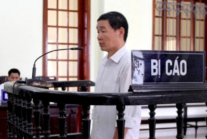 Bị cáo Dũng trước vành móng ngựa (ảnh CTV).