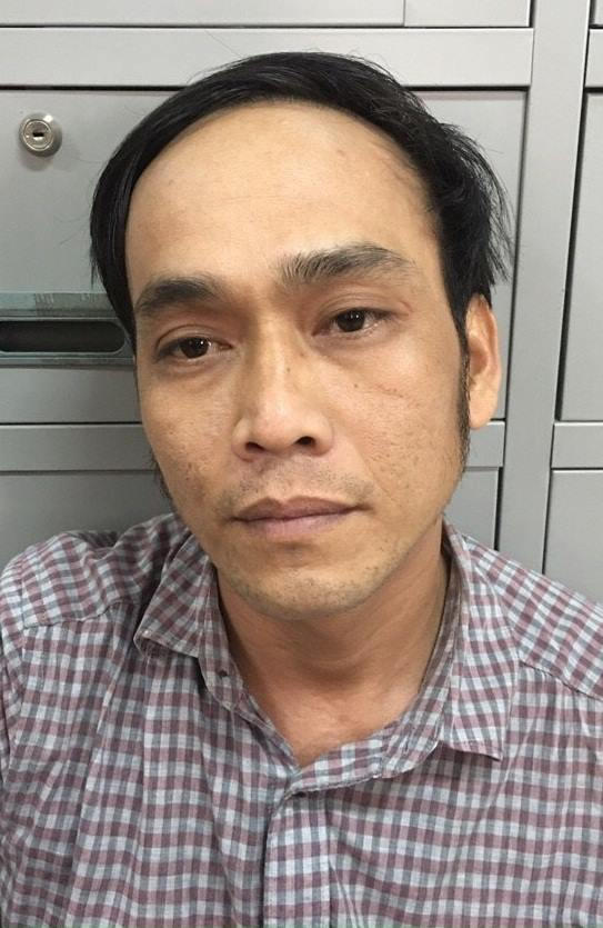 Đối tượng Nguyễn Tiến Thịnh tại cơ quan điều tra (ảnh công an cung cấp).