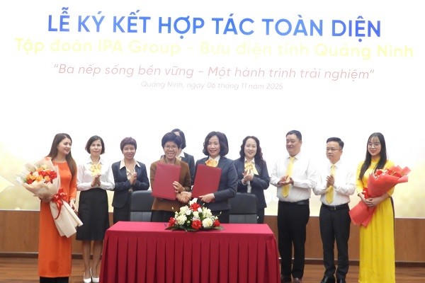 Lãnh đạo Bưu điện tỉnh Quảng Ninh và đại diện Tập đoàn IPA Group ký kết hợp tác.