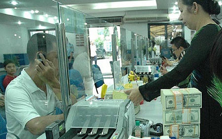 Ngân hàng khó mua USD vì tỷ giá thấp (Ảnh minh họa)