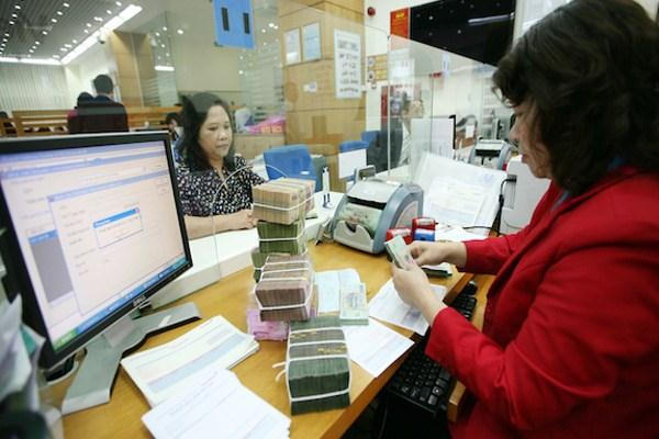 Các doanh nghiệp cam kết trong vòng 6 tháng đầu năm 2017 sẽ nộp hơn 2.400 tỷ đồng trên số thuế còn thiếu vào NSNN (ảnh minh họa: TTXVN)