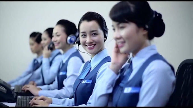 Nhân viên chăm sóc khách hàng trực tổng đài 18001091 và 9191 làm việc tại Tập đoàn viễn thông Vinaphone