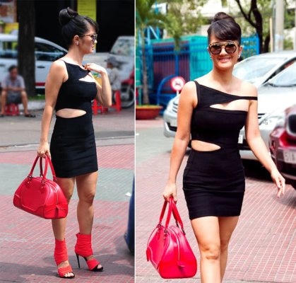 Có vẻ như thời tiết quá nóng nực, nên Diva Hồng Nhung đã phải tự mình "xén bớt" vài điểm trên chiếc váy cho "thoáng" thì phải. Ảnh: internet.