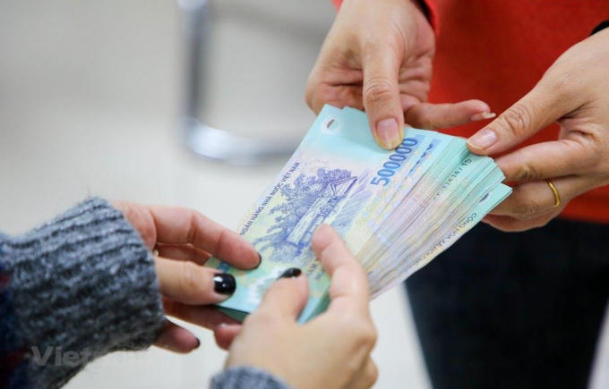 Thưởng Tết Dương lịch năm 2021 tăng kỷ lục so với các năm trước. (Ảnh minh họa: PV/Vietnam+)
