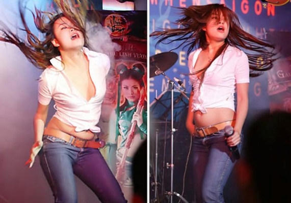 Chiếc quần cạp trễ này hình như đã "phản bội" chiếc bụng ngấn mỡ của Hoàng thùy Linh. Ảnh: internet.