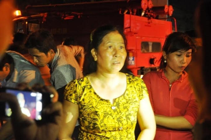 Khuôn mặt bần thần của những người thoát nạn sau vụ cháy vẫn hiển hiện rõ rệt.