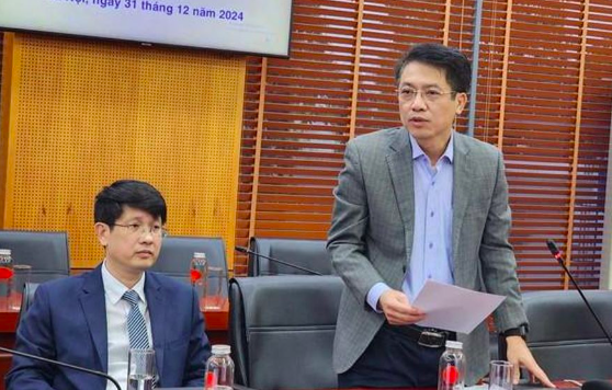 Ông Nguyễn Quang Dũng thông tin tại cuộc họp báo chiều 31/12.