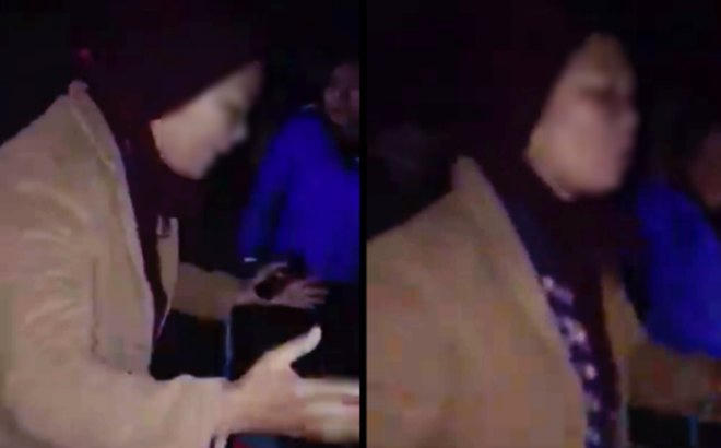 Người phụ nữ trung niên trong clip đánh ghen hộ con dâu gây xôn xao cộng đồng mạng (Ảnh cắt từ clip).