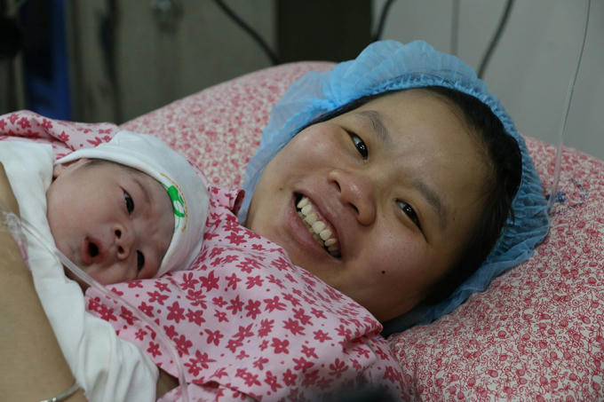 Chị Trần Thị Liên và con trai Phúc An.