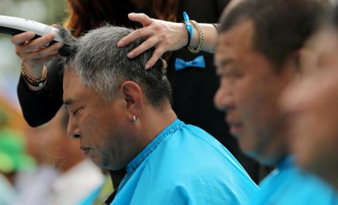 Phần lớn những người tham gia biểu tình cạo đầu là nông dân. (Ảnh: Yonhap)