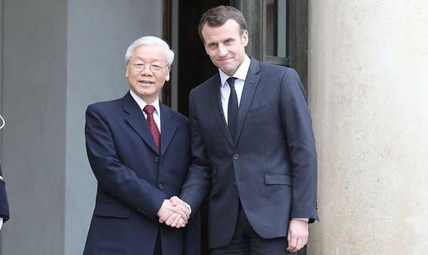 Tổng Bí thư Nguyễn Phú Trọng và Tổng thống Pháp Emmanuel Macron. Ảnh: TTXVN