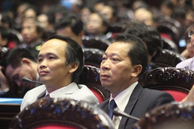 Tiến sĩ - Nhà báo Đào Văn Hội, Tổng Biên tập Báo Pháp luật Việt Nam (bìa phải) và Tiến sĩ - Luật sư Trịnh Văn Quyết, Chủ tịch Hội đồng quản trị CTCP Tập đoàn FLC đang dự Lễ Hưởng ứng Ngày Pháp luật 2015 tại Hội trường Bộ Quốc Phòng (số 7 Nguyễn Tri Phương, Hà Nội).