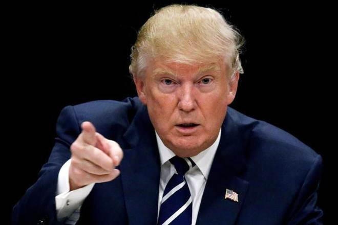 Tổng thống Donald Trump dọa sẽ mở rộng phạm vi áp thuế đối với hàng hóa từ Trung Quốc và EU. (Ảnh: Reuters)