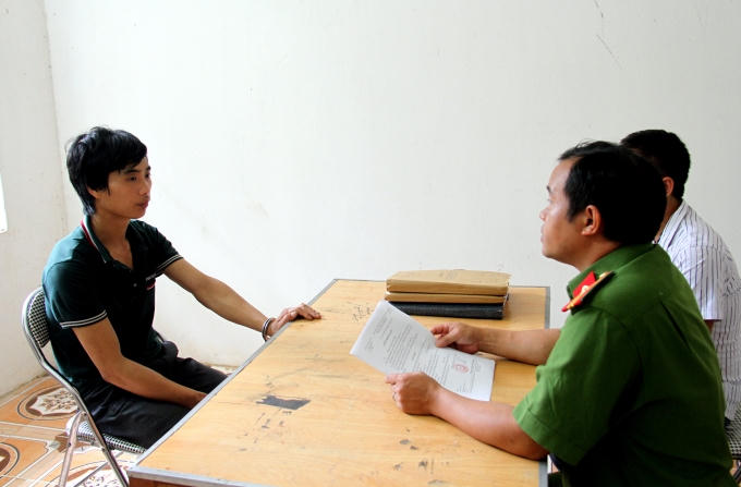 Nghi can khai nhận tại cơ quan điều tra. Ảnh: Công an tỉnh Lào Cai.