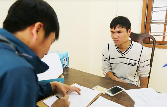 Đối tượng Lý Thiết Thuần tại cơ quan điều tra.