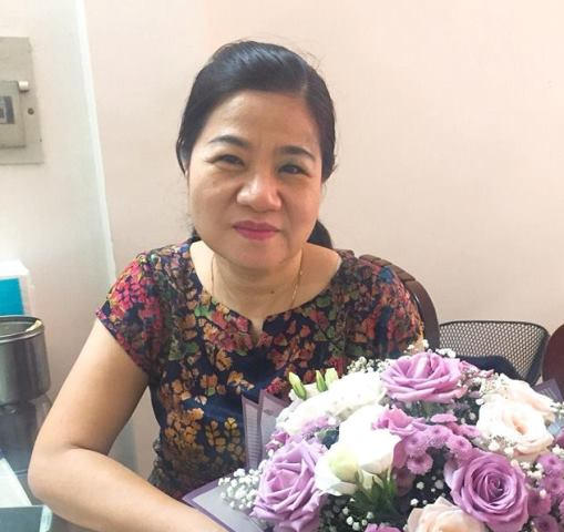 Bà Phạm Thu Dung, nhân viên Trung tâm Y tế Dự phòng Hà Nội.