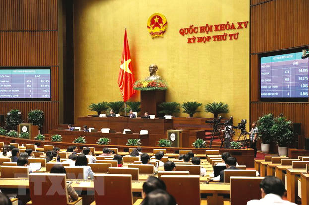 Quốc hội biểu quyết thông qua Luật Phòng, chống bạo lực gia đình-sửa đổi. (Ảnh TTXVN)