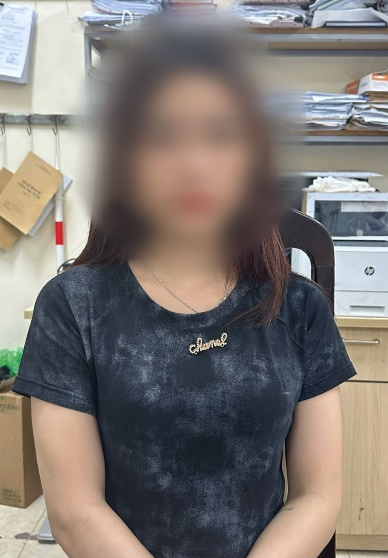 Vũ Thị Minh A. bị bắt giữ để điều tra về hành vi môi giới mại dâm. Ảnh: CAHN