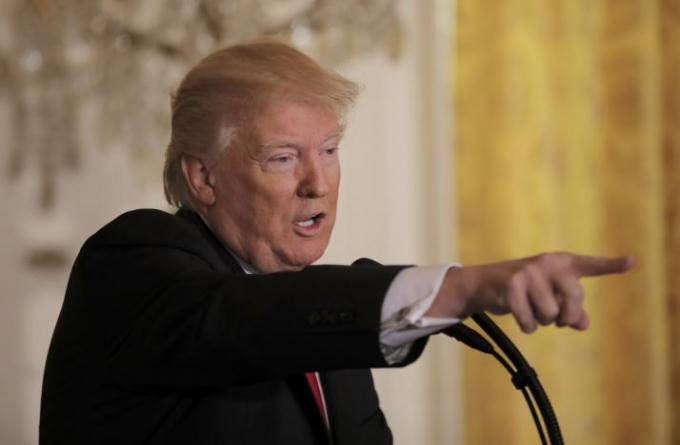 Tổng thống Mỹ Donald Trump trả lời phóng viên trong cuộc họp báo. (Ảnh: Reuters)