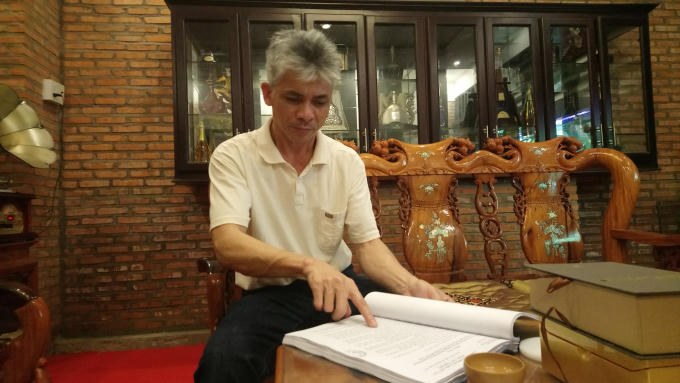 Ông Trương Văn Quang trình bày sự với phóng viên.