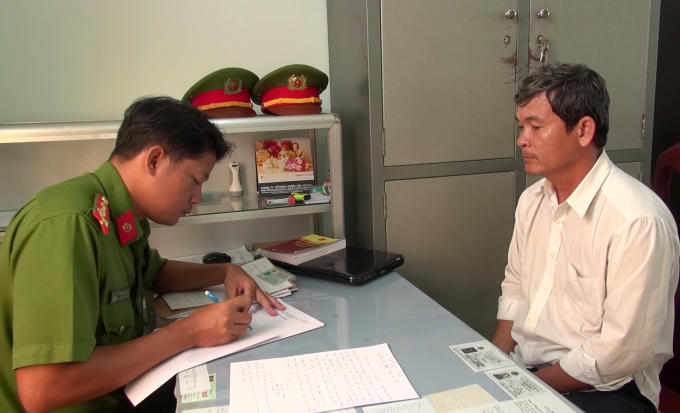 Ông Dương Minh Thiện tại cơ quan công an, ảnh do công an cung cấp