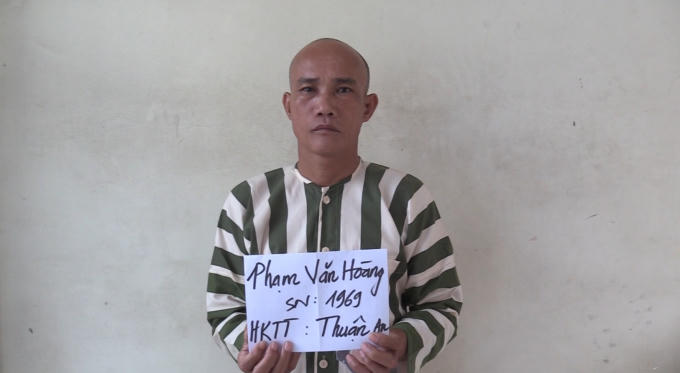 Phạm Văn Hoàng tại cơ quan công an