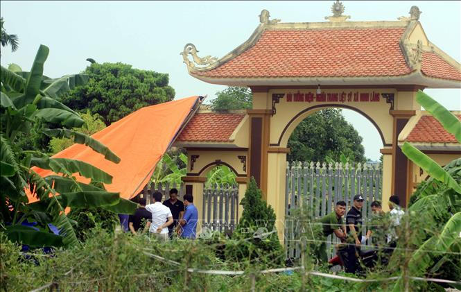 Lực lượng chức năng của tỉnh Thái Bình khám nghiệm hiện trường. Ảnh: Thế Duyệt/TTXVN