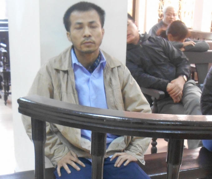 Bị cáo Đoàn Quang Sơn tại phiên tòa sáng nay 9/12 (Ảnh: Nguyễn Xinh)