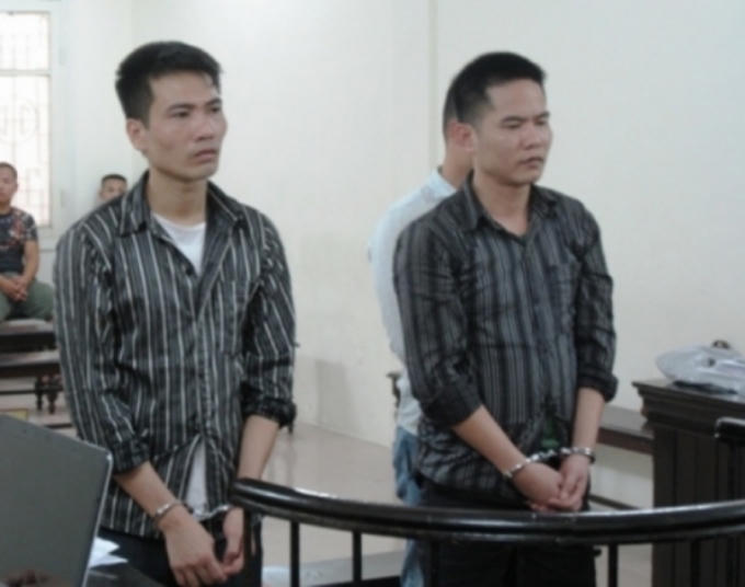 Các bị cáo trong phiên sơ thẩm tháng 7/2015.