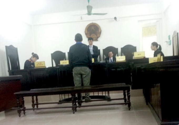 Ông Phạm Ngọc Quế trước vành móng ngựa trong phiên tòa phúc thẩm.