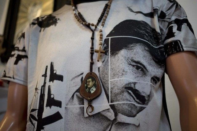 Joaquin El Chapo Guzman, kẻ đứng đầu băng đảng ma túy khét tiếng Sinaloa, Mexico, từng lọt vào danh sách tỷ phú thế giới từ năm 2009 đến năm 2012 do tạp chí danh tiếng Forbes bình chọn. Cũng theo Forbes, năm 2013, y đứng thứ 67 trong số những nhân vật quyền lực nhất thế giới. Ảnh: AP