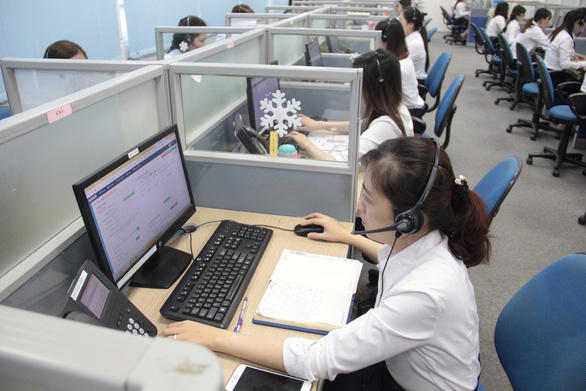 Một đơn vị triển khai xử lý dịch vụ công trực tuyến tại Đà Nẵng - Ảnh: Trường Trung/Báo Tuổi trẻ
