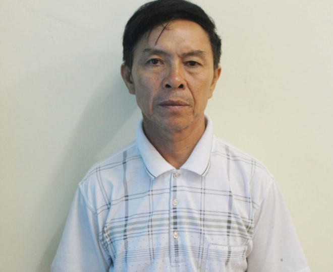 Nghi phạm Nguyễn Hữu Sơn tại cơ quan công an.
