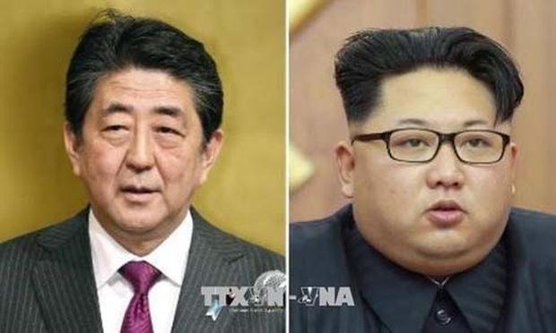 Thủ tướng Nhật Bản Shinzo Abe (trái) và Nhà lãnh đạo Triều Tiên Kim Jong-un. Ảnh: Kyodo