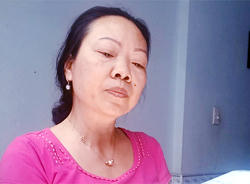 Bà Thu lúc bị mời lên công an làm việc. Ảnh: Trần Duy.