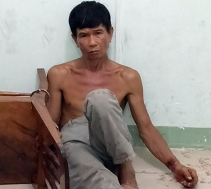 Sát nhân Phan Minh Cường khi bị bắt giữ.