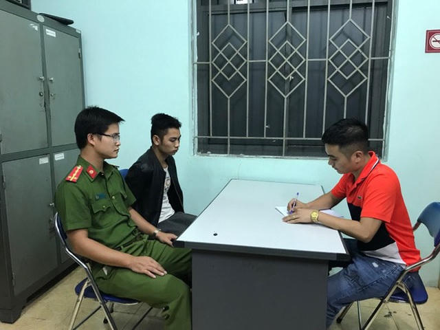 Lực lượng chức năng lấy lời khai các nghi phạm sau khi 2 đối tượng bị di lí từ Yên Bái về Hà Nội.