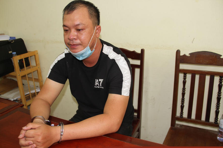 Nghi phạm Vũ Văn Khải tại trụ sở công an.