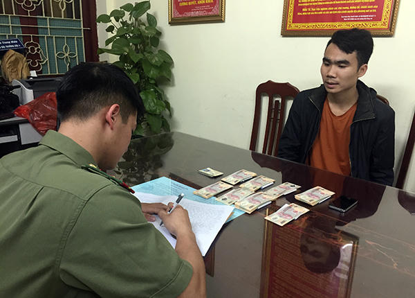 Đối tượng Nông Quốc Hoàng tại cơ quan công an.