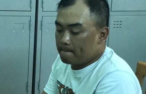 Phạm Khắc Tường tại cơ quan công an.