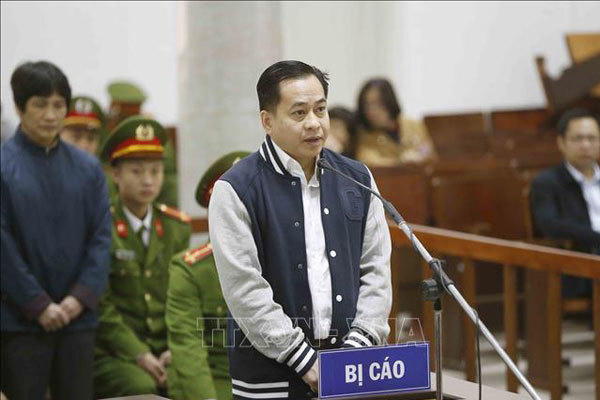 Phan Văn Anh Vũ (tức Vũ "nhôm") tại phiên tòa sơ thẩm. Ảnh TTXVN.