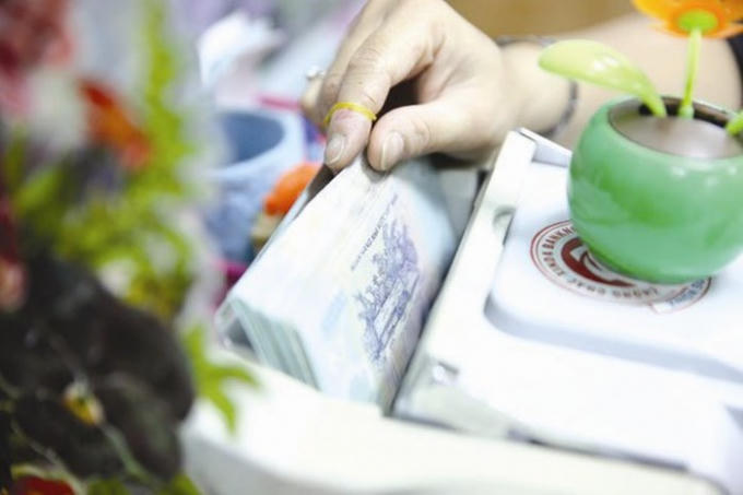 Không có bằng chứng rõ ràng là đồng tiền định giá cao hay thấp sẽ thúc đẩy tăng trưởng trong trung hay dài hạn. Ảnh: THÀNH HOA