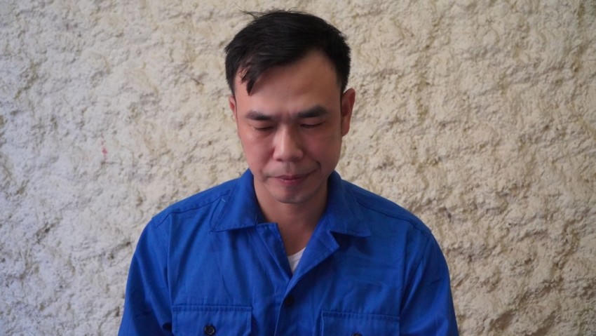 Đối tượng Nguyễn Mạnh Tuân tại cơ quan công an. Ảnh: CACC