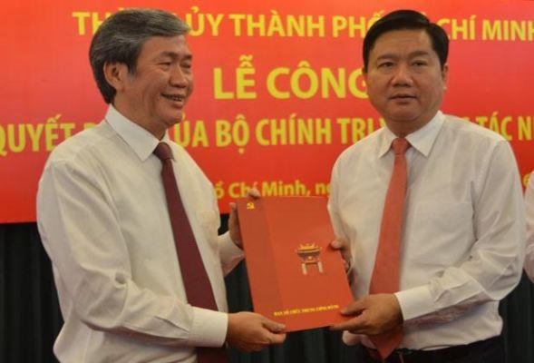 Thường trực Ban Bí thư Đinh Thế Huynh và tân Bí thư Thành ủy TP.HCM Đinh La Thăng.