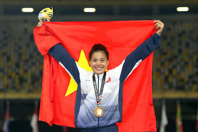 Tưởng như bị loại ngay trước thềm SEA Games 29, nhưng Nguyễn Thị Huyền vẫn kịp trở lại và lập nên kỷ lục mới (ảnh: Q.H).