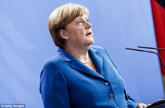 Bà Angela Merkel phải đối mặt với sự chỉ trích từ người dân vì chính sách nhập cư của mình. (Ảnh: Getty)