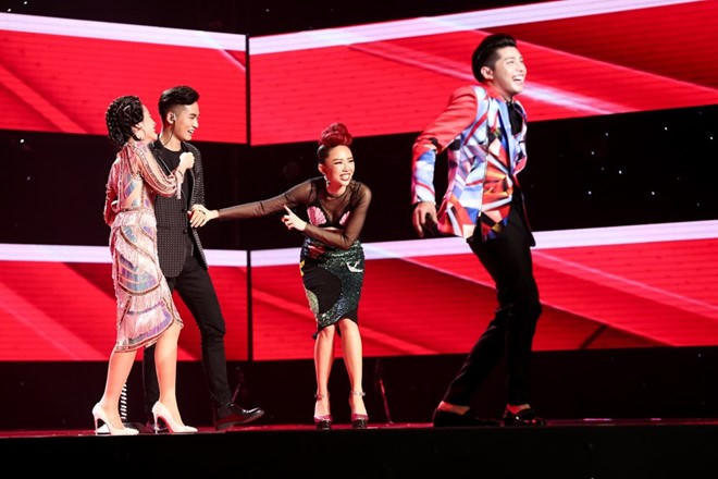 Giám đốc âm nhạc Hồ Hoài Anh khẳng định HLV không nhất thiết phải là "vocal training" (giáo viên thanh nhạc). Ảnh: Windy.