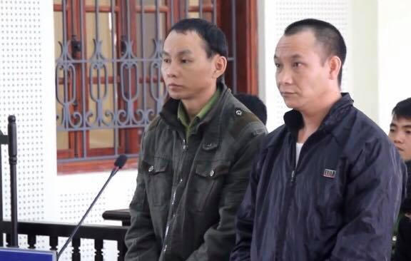 Hai bị cáo tại phiên xét xử ngày 12/3.