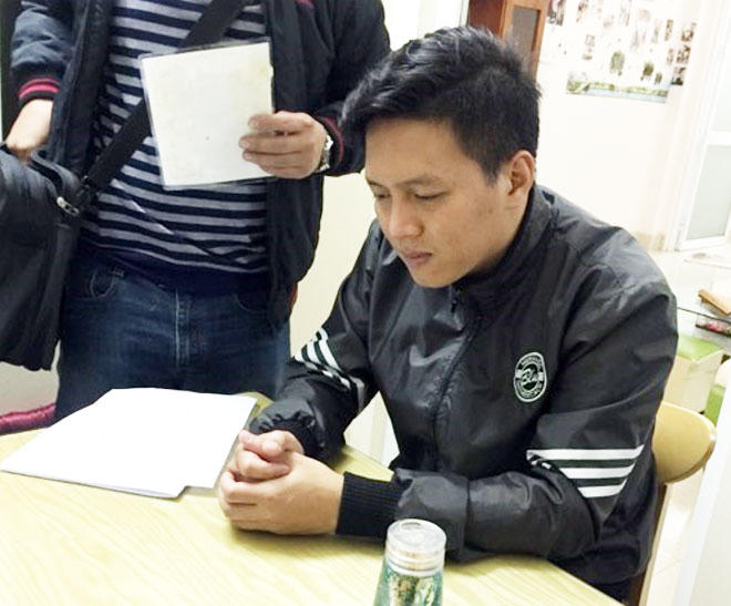 Trần Hoài Nam tại cơ quan Công an.