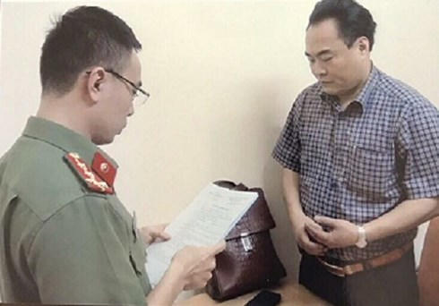 lBị can Trần Đức Trung, nguyên Chủ tịch HĐTV Trung tâm Hỗ trợ người nghèo trong phát triển nông thôn mới.